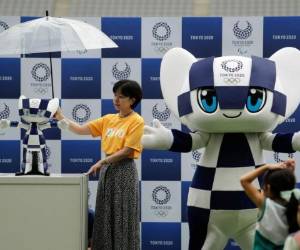 Los organizadores han destrozado los récords de ingresos de patrocinio local, que han superado los 3.000 millones de dólares alrededor de tres veces más que cualquier otra edición. Foto: AP.