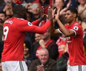 Los jugadores del Manchester United celebran después de que el delantero inglés del Manchester United Marcus Rashford marcara el gol de apertura. Foto AFP
