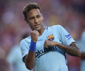 Neymar of Barcelona gestures after scoring during their International Champions Cup (ICC) football match against Manchester United on July 26, 2017 at the FedExField, in Landover, Maryland. / AFP PHOTO / Brendan Smialowski