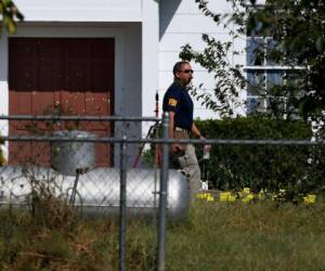 El agente especial de la policía federal Christopher Combs dijo que el teléfono fue enviado al cuartel general del FBI en Quantico, Virginia. Foto: AFP