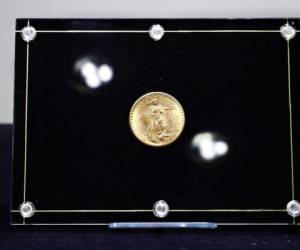 El ejemplar forma parte de la última serie de monedas de oro conocidas como 'Double Eagle' (Doble Águila) emitidas por la Casa de la Moneda estadounidense. FOTO: AFP
