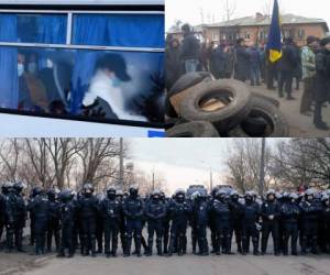 Una ola de protestas se desató, la mañana de este jueves, entre los habitantes de Novi Sanjari, una pequeña ciudad de Ucrania; ante la posible llegada de 72 personas evacuadas de China a causa de la propagación del Coronavirus. Fotos: AP/AFP.