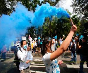 Una mujer protesta durante una marcha contra el aborto, el domingo 3 de octubre de 2021, en la Ciudad de México. (AP Foto/Ginnette Riquelme).