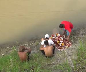 Familiares y rescatistas participaron en la búsqueda de José Carlos Cruz, de 15 años, localizado sin vida en el río Chamelecón.
