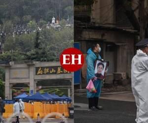 En el cementerio Biandanshan, grupos de habitantes, desconsolados y con mascarilla, hacían fila pacientemente este martes para pasar por el control de los guardias de seguridad y de la policía, vestidos con trajes de protección, antes de enterrar bajo un cielo plomizo a amigos y familiares. Una escena que se ha venido repitiendo estos últimos días en Wuhan. Fotos: AFP
