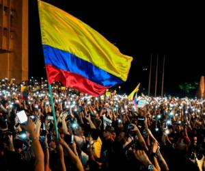 La gente participa en una protesta contra el gobierno del presidente colombiano Iván Duque, en Bogotá. Foto: AFP.