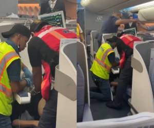 El personas de la Empresa Hondureña Infraestructura y Servicios Aeroportuarios (EHISA) le da los primeros auxilios a la pasajera.