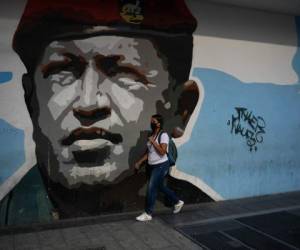 La emergencia 'redujo la presión sobre él al detener las movilizaciones' que la oposición buscaba relanzar, señala Benigno Alarcón, director del Centro de Estudios Políticos de la Universidad Católica Andrés Bello. Foto: AFP.