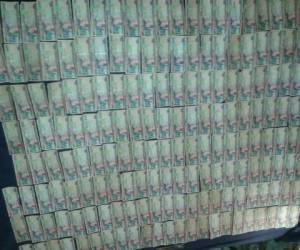 El dinero fue contabilizado por autoridades. Fueron al menos tres millones de lempiras los incautados. Foto: Cortesía: Ministerio Público (MP).