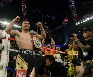 Vargas tuvo dificultades para enfrentar la velocidad de Pacquiaoque al final se quedó con el título. Foto: AP.