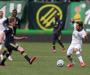En foto de archivo del domingo 8 de marzo del 2020, el mediocampista argentino SebastiÃ¡n Blanco, de los Timbers de Portland, trata de iniciar un ataque durante un partido de la MLS ante Nashville, en Portland, Oregon. El martes 14 de abril la MLS podrÃ­a posponer mÃ¡s tiempo el inicio de la temporada y cada vez es menos probable que se dispute una campaÃ±a completa de 34 partidos de temporada regular (Sean Meagher/The Oregonian vÃ­a AP)