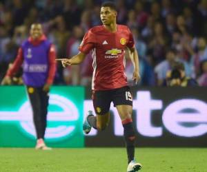 Manchester United's forward Marcus Rashford celebrates after scoring the opener during their UEFA Europa League semi final first leg football match RC Celta de Vigo vs Manchester United FC at the Balaidos stadium in Vigo on May 4, 2017.Manchester won 1-0. / AFP PHOTO / MIGUEL RIOPA