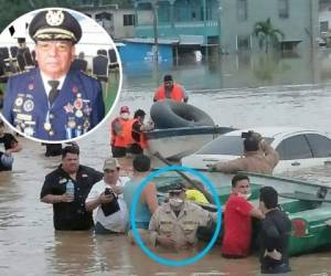 El excomandante del Cuerpo de Bomberos se volvió popular en el país luego de esta fotografía en donde se le veía con el agua hasta la cintura, ayudando a empujar una lancha en una zona devastada por las lluvias en al zona norte de Honduras.