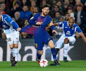Leo Messi brilló nuevamente vistiendo la 10 del FC Barcelona. (AFP)