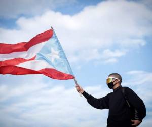 'Yo voy a seguir con ustedes', prosiguió. 'Puerto Rico, tenemos que darle el ejemplo al mundo'. Foto: AFP.
