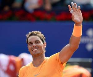 El español, ganador de 77 torneos ATP, repitió domingo triunfal tras haber vencido hace una semana en Montecarlo. / AFP PHOTO / Josep LAGO