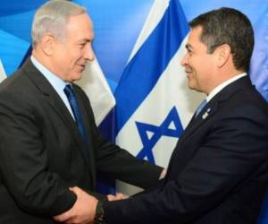 El primer ministro israelí Benjamín Netanyahu junto al presidente hondureño, Juan Orlando Hernández.
