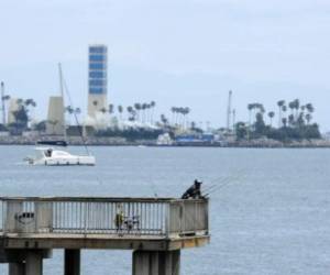 La esposa del acusado se salvó de milagro, gracias a que un pescador la rescató. Foto: Agencia AFP