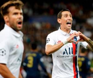 Ángel Di María celebró con todo sus dos tantos al Real Madrid. (AFP)