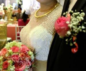 Los hondureños que quieran casarse en España deberán de presentar varios requisitos. Foto: Agencia AFP