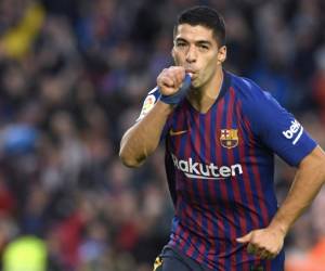 Luis Suárez, delantero uruguayo del Barcelona, ​​celebra un gol en el partido de fútbol de la Liga española entre el FC Barcelona y el Real Madrid CF en el estadio Camp Nou de Barcelona el 28 de octubre de 2018. / AFP / LLUIS GENE.