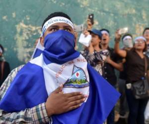 La fuerte represión de las manifestaciones, que dejó a Managua y otras ciudades cubiertas de escombros, indignó al país y galvanizó a la población para exigir la salida de Daniel Ortega. (AFP)