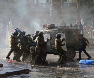 El jueves se produjeron graves disturbios en Santiago y otras ciudades como Valparaíso, Arica, Antofagasta y Concepción. Foto: AFP.