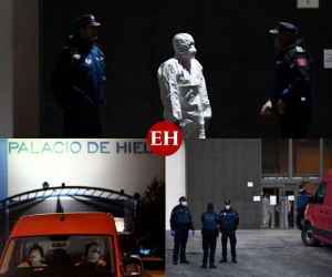En el centro comercial del Palacio de Hielo, militares enfundados en trajes de protección acuden en furgonetas rojas. En la pista de hielo de este recinto se depositan los cadáveres para aliviar los saturados servicios funerarios de la capital. Fotos AFP