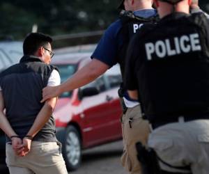 Migranye detenido en EEUU, Foto AP.