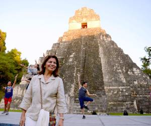 Costa Rican President Laura Chinchilla poses for photographers at Tikal archaeological site in Peten departament, 560 kms north of Guatemala City, on December 20, 2012. Ceremonies will be held here to celebrate the end of the Mayan cycle known as Bak'tun 13 and the start of the new Maya Era on December 21. AFP PHOTO/Johan ORDONEZ