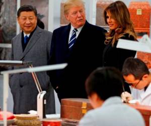El presidente Donald Trump y su esposa Melania fueron recibidos en el antiguo palacio imperial chino. Foto AFP