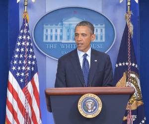 US President Barack Obama speaks on the Boston Marathon explosions on April 15, 2013 at the White House in Washington, DC. At least two people were killed and 22 wounded when two explosions struck near the finish line of the Boston Marathon, sparking scenes of panic, police said. AFP PHOTO / Mandel NGAN