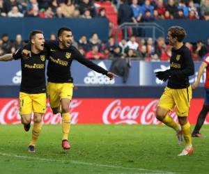 El Atlético está aún a 9 puntos de sus vecinos del Real Madrid, líderes del campeonato, y dos del Barça. Foto: AFP