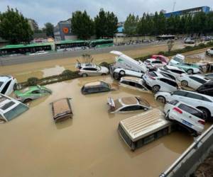 Las lluvias estacionales provocan cada año inundaciones en China, pero la amenaza ha crecido en los últimos años. FOTO: AFP