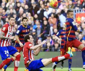 El Barça, actual 'rey de Copas' con 28 trofeos, acudirá al estadio Vicente Calderón con las bajas sensibles de Andrés Iniesta y Sergio Busquets. Foto: AFP
