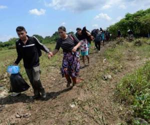 La primera caravana migrante salió el pasado 13 de octubre desde la ciudad de San Pedro Sula, zona norte de Honduras. Foto: Agencia AFP.