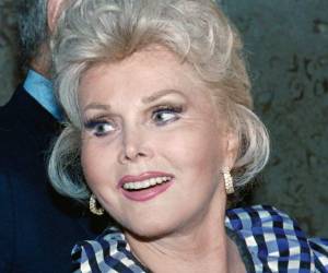 Su afición por llamar 'darling' (querido o querida) a las personas con las que se encontraba, o 'dahlink', tal cual ella lo pronunciaba en su muy parodiado acento húngaro, se convirtió en una suerte de seña de identidad. Foto: AFP