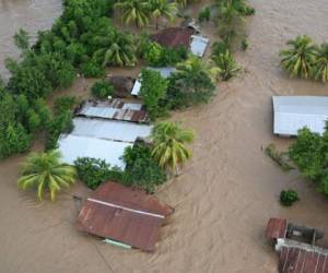 En el corto y mediano plazo, la deuda de Honduras se incrementará por la contratación de fondos para reparar los daños del huracán.