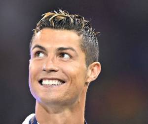 Cristiano Ronaldo, delantero del Real Madrid, es acusado de defraudar al fisco español por 14,7 millones de lempiras. (Foto: Agencias/AFP)