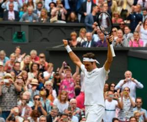 El suizo Roger Federer al clasificar a la final de Wimbledon. (Fotos: Agencias/AFP)