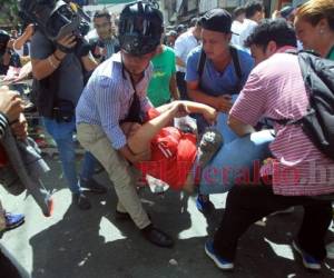 Vendedores del centro de la capital de Honduras se vieron afectados este martes durante la jornada de protestas contra Juan Orlando Hernández. Foto: Alex Pérez/ EL HERALDO.