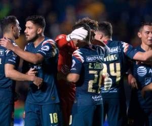 América consumó una noche memorable ante Tigres. Fotos: AFP.