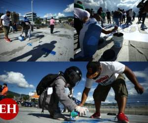 El puente Paz y Esperanza del bulevar Suyapa fue de nuevo el lienzo para que los hondureños expresaran su inconformidad por el cuestionado manejo de los fondos estatales para combatir la pandemia. #JOHselorobó es la nueva frase que pintaron en el paso aéreo. Fotos Emilio Flores| EL HERALDO