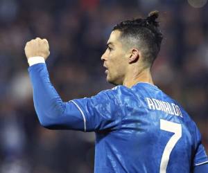 Cristiano Ronaldo de la Juventus celebra tras anotar el primer gol del cuadro durante el partido de la Serie A italiana contra Spal. Foto: AP