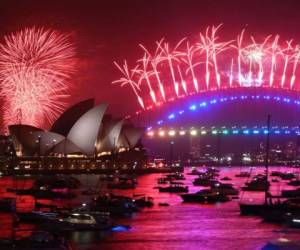 Cada inicio de año, el emblemático Harbour Bridge y la Opera House son el centro de atención en Sydney, primer lugar del mundo en recibir el 2020, por el espectáculo de fuegos artificiales. Fotos: AFP.