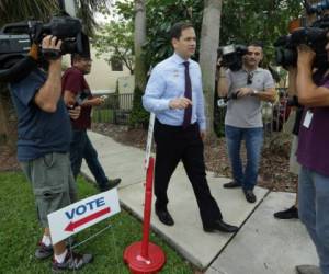 El republicano Marco Rubio derrotó el martes al demócrata Patrick Murphy y volverá a Washington como senador por Florida. /Fotos AP y AFP/