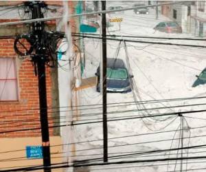 Calles de Puebla se cubrieron de blanco por el granizo que cayó durante tormenta el viernes.