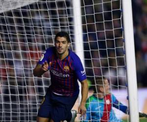 Luis Suárez salvó al Barcelona con un doblete ante el Rayo. Foto AFP