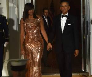 Michelle destacó en la última cena oficial que hará como primera dama. Fotos: AFP
