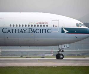 El temor de los turistas por el brote del virus obligó a las empresas a suspender sus conexiones con la potencia mundial. Foto AFP